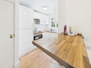 KITCHEN & BREAKFAST BAR- click for photo gallery